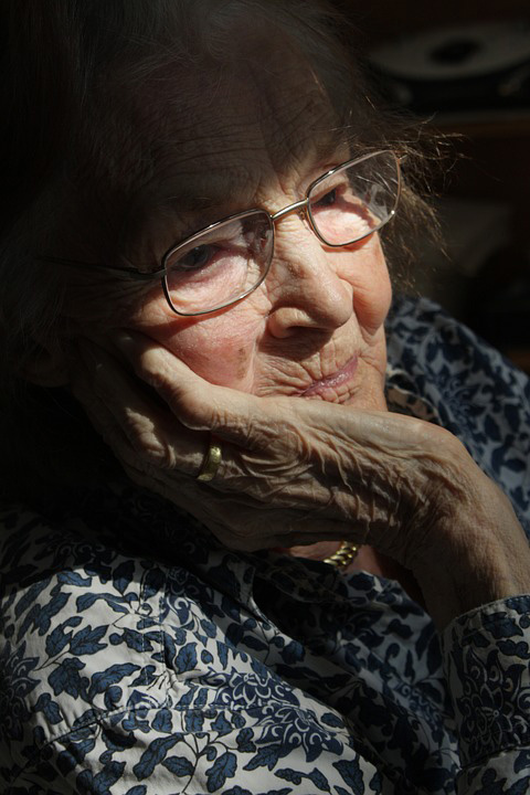 elderly woman face in focus