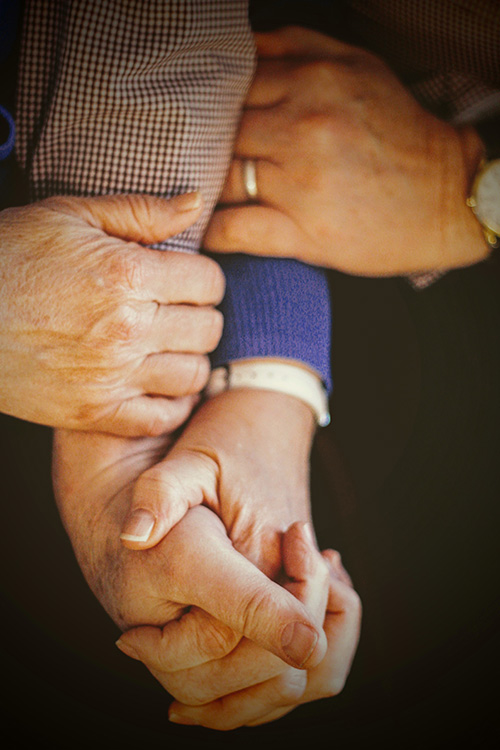 various hands holding each other