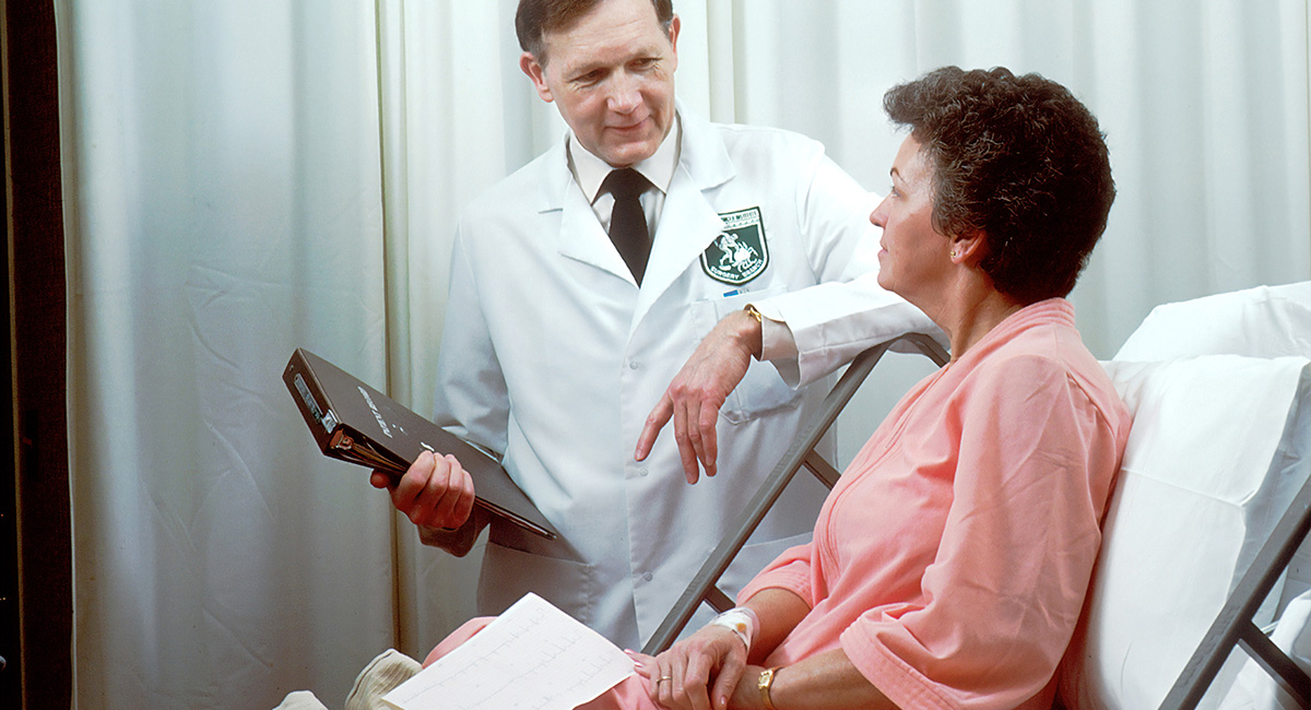 doctor speaking to his patient