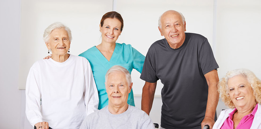 caregiver with elderly group