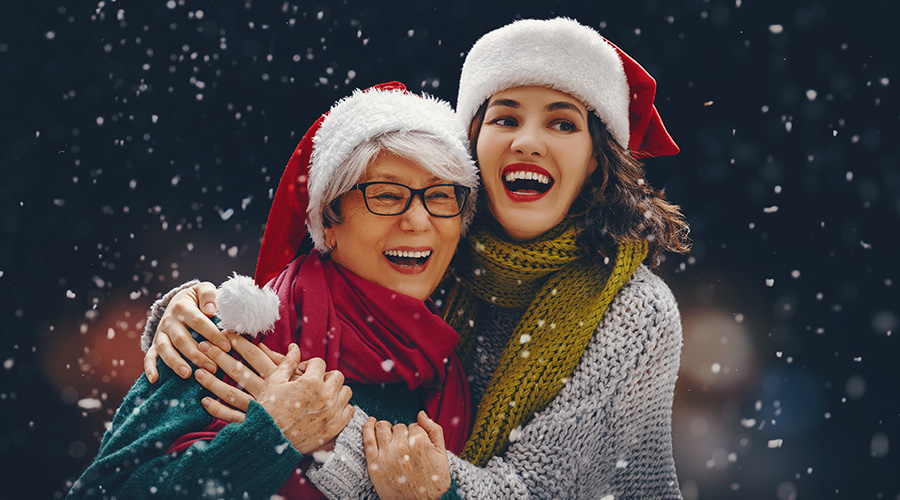 elderly and caregiver in snow