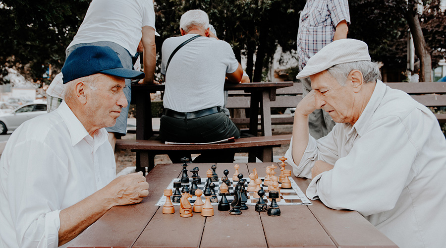 seniors playing chess together