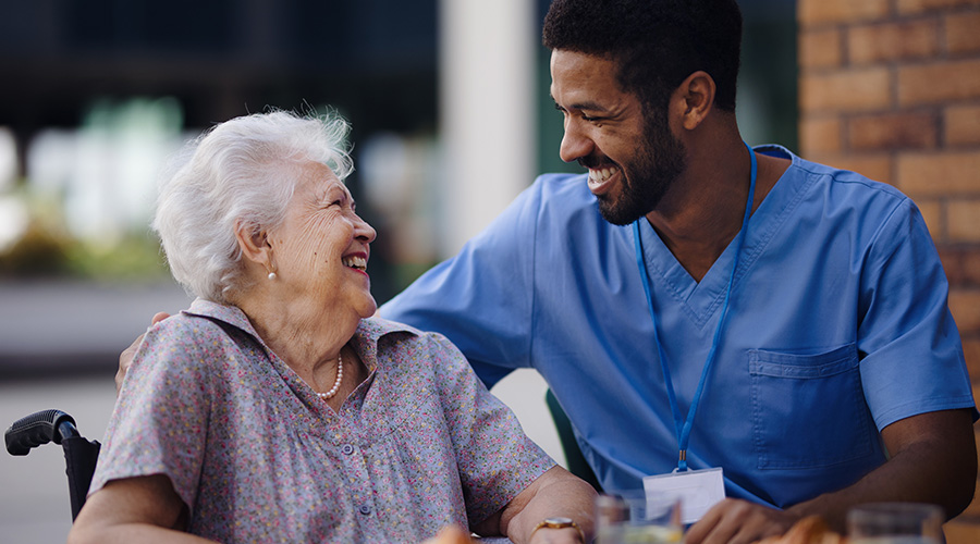 elderly and her caregiver having a conversation