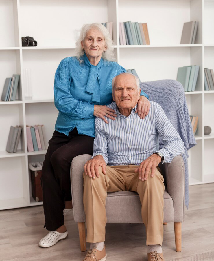 happy old woman talking with her caretaker