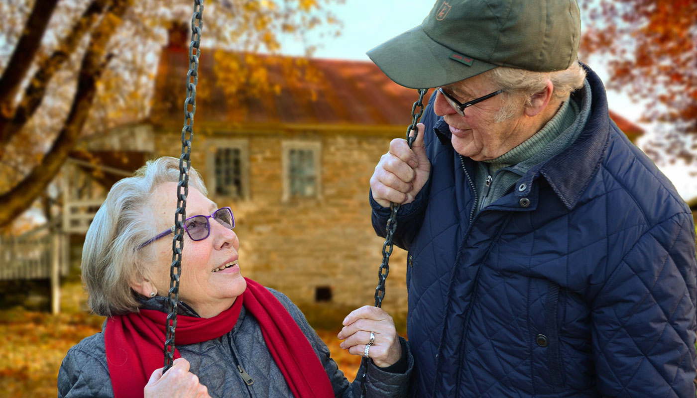 elderly couple sharing moments with each other in the park