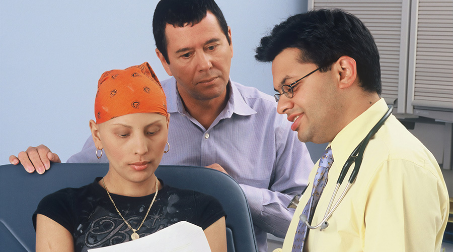 cancer patient consulting with a doctor