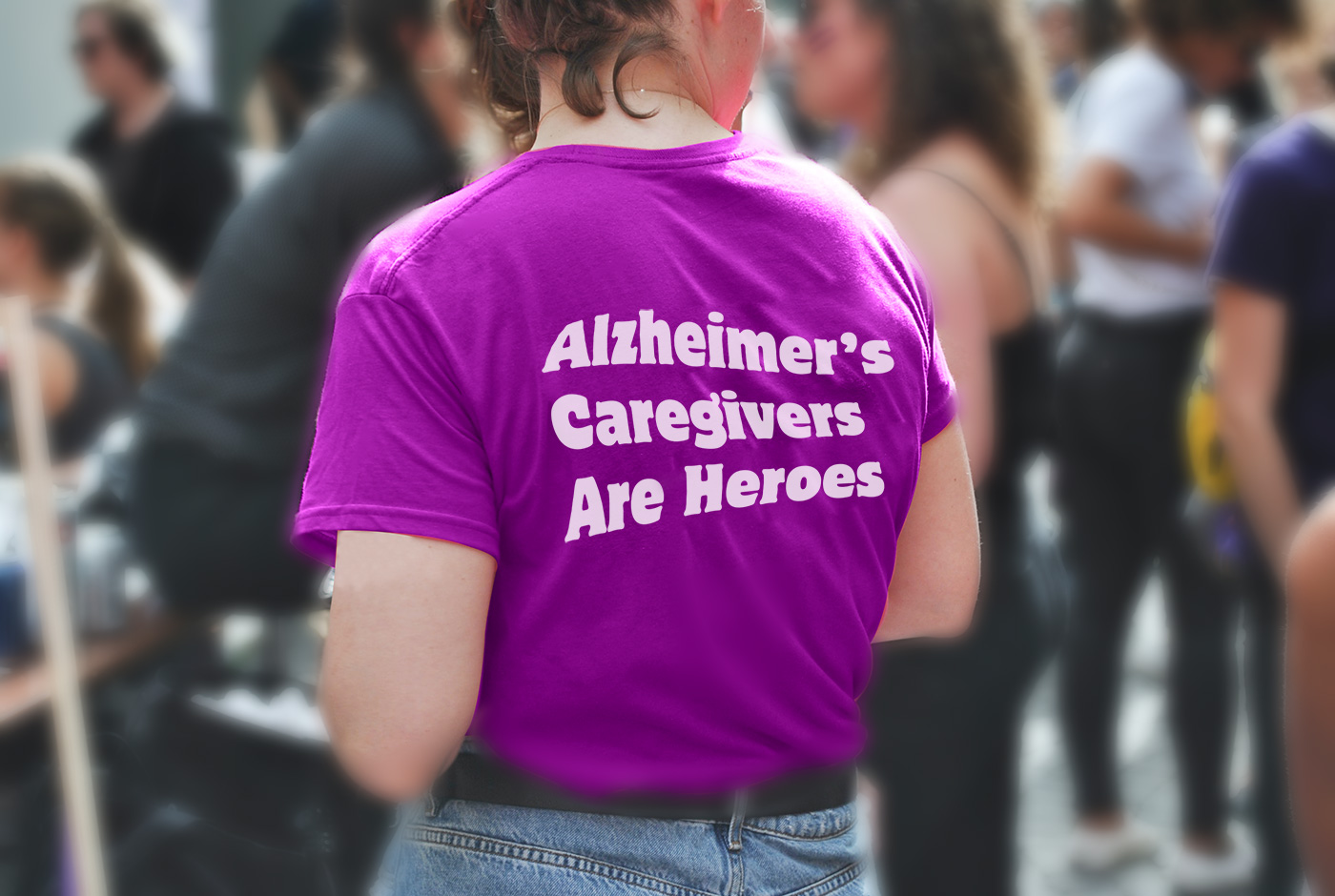 woman wearing purple shirt with alzheimer's slogan