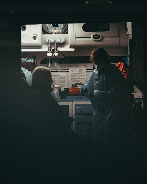 physician attending a sick elderly patient