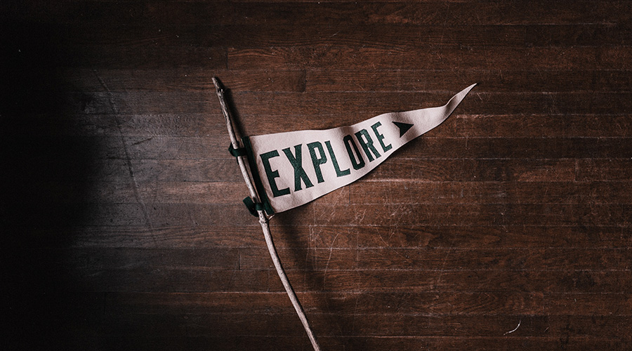 the word explore written in a flag