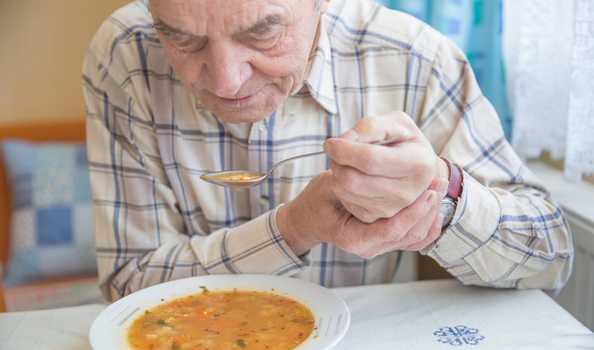 elderly with Parkinson's eating diet food