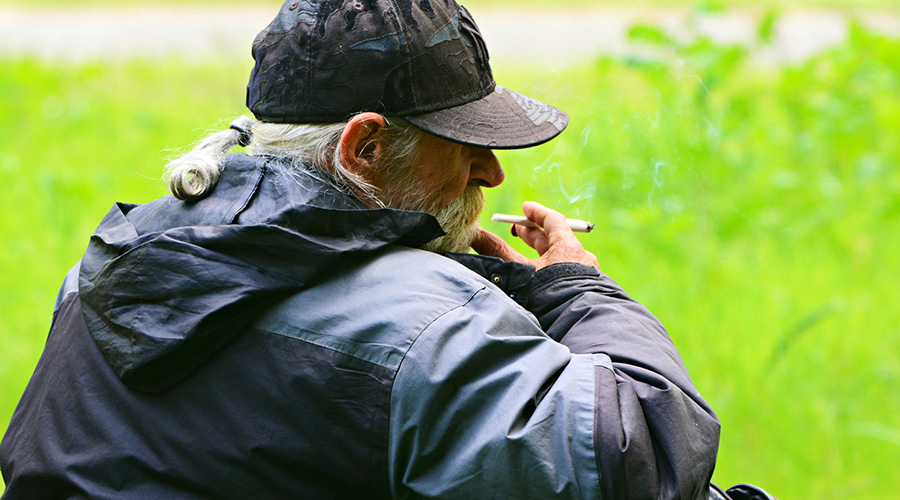 elderly man smoking