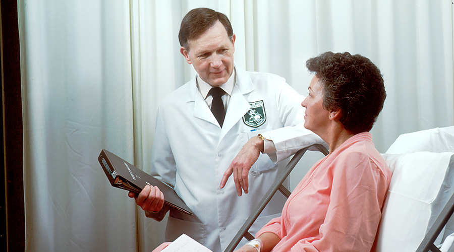 doctor talking to a cancer patient