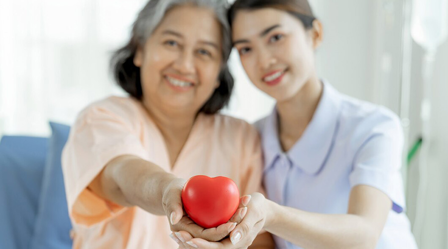 caregiver taken good care on elderly woman