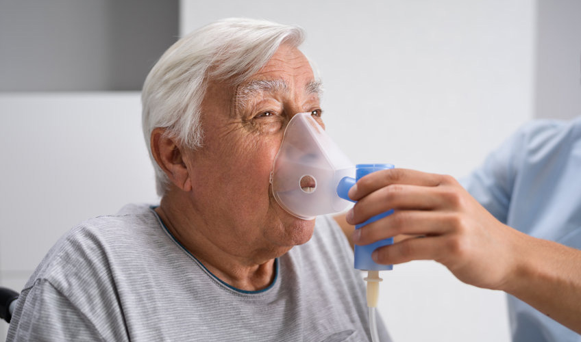 senior using oxygen