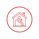 Red outline icon of a person sitting on a bean bag inside a house, representing home care, holding a phone or device, all enclosed within a red circle on a white background.