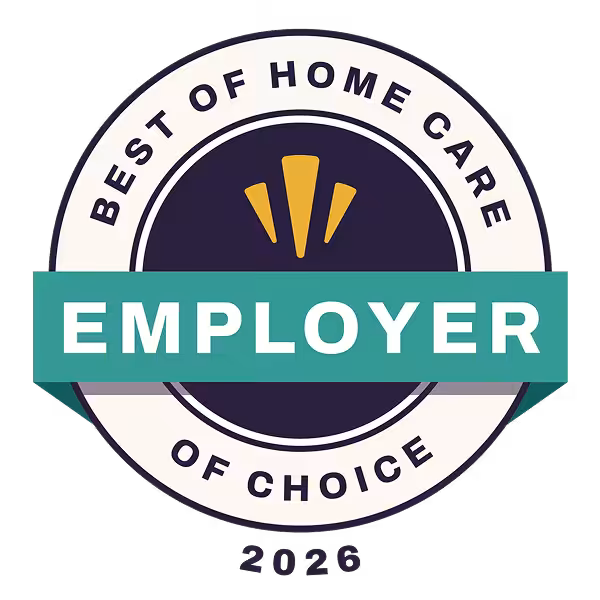 Circular badge featuring Best of Home Care Employer of Choice 2026 text, a teal banner reading EMPLOYER across the center, and three gold shapes above the banner on a dark background. Perfect for recognizing excellence in home care.