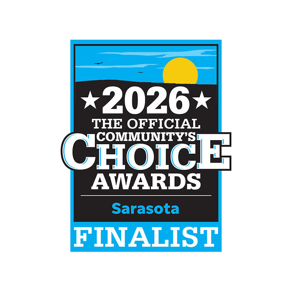 A rectangular badge with a sun over hills, text reads 2026 The Official Communitys Choice Awards Sarasota Finalist in white and blue on a black background—a mark of excellence for home care providers.